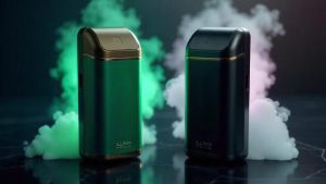 Two sleek IQOS Iluma Prime devices, one in metallic green and gold, and the other in metallic black and gold, standing upright with plumes of colored vapor (green and pink) rising around them on a dark marble surface.